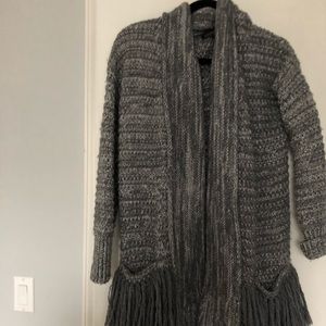 sweater with fringe pockets